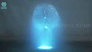 Stainless steel dandelion water fountain color changing at night, creating a relaxing atmosphere