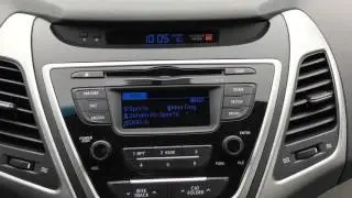 How to change the temperature display from Celsius to Fahrenheit on a 2015 Hyundai Elantra