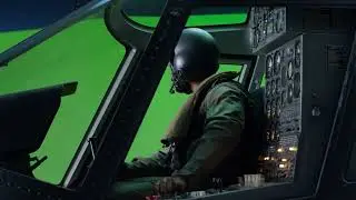 Free green screen helicopter pilot in cockpit flying.