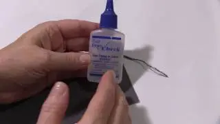 Securing Serger Thread Tails With Dritz Fray Check
