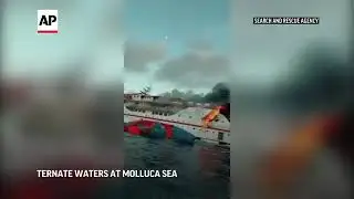 Indonesia ferry catches fire, passengers jump in the sea