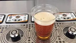 Trying a 'Bottoms Up' beer at the NY State Fair