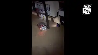 Man breaks window to rescue kids trapped during severe flood in Spain
