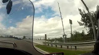 Traveling Across the ICW on Bridge Rd Under Canopy of Trees Motorcycle Ride in Hobe Sound