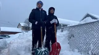 Young entrepreneur offering shoveling services to residents in South Buffalo