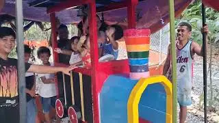 Our new wooden Train being checked by the kids, who will later play with it...
