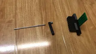 How to make a Spring-powered LEGO gun (with only a few pieces, not a gun)