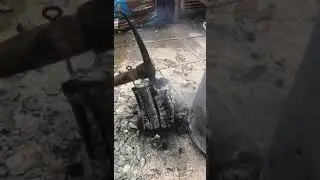 Pick axe gets stuck in a burning log
