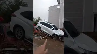 Mangled cars and damage after deadly flooding in Indonesia