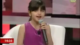 Cute girl singing a song of Justin barber (baby baby)