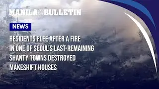 Residents flee after a fire in one of Seoul's last-remaining shanty towns destroyed makeshift houses
