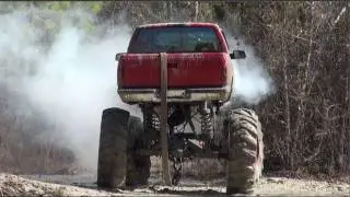 MOTOR BLOWS IN GMC MUD TRUCK WHILE PULLING DEEP MUD HOLE!!