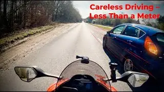 Driver puts motorcyclist's life at risk🤬