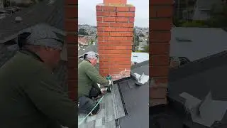 So this how doing the step flashing on the chimney brick with my roofer.