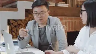 Pair of Asian Business Partners Brainstorming | Stock Footage - Envato elements
