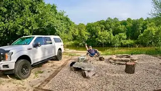 Solo Truck Camping: On the banks of a crystal clear river.