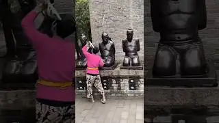 Why do Chinese people beat these statues? #shorts #shortsfeed