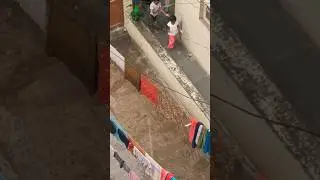 Kids playing with rain drops #rain #raininbengaluru #happiness #quotes #hindiquotes #qouteoftheday