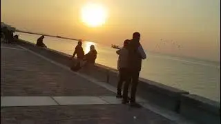 A peaceful evening walking the dog along the seaside in Souq Sharq Kuwait 🐕🌊🇰🇼
