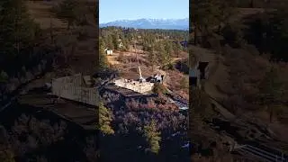 Drone flying over mountain home build. From foundation to framing! #construction