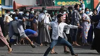Myanmar military supporters attack anti-coup protesters in Yangon