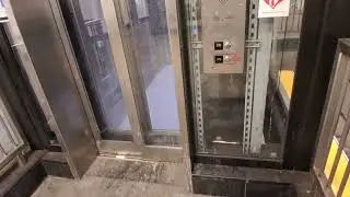 Mongrain hydraulic glass elevator at the Tremont Avenue B, D station (Bronx, NY)