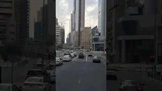 Kuwait city on road signal super supercar and building views #kuwait #kuwait #road #city #supercars