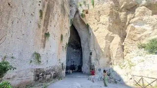 Walking inside the Ear of Dionysius in Neapolis Archaeological Park, Syracuse, Sicily (25.8.24)