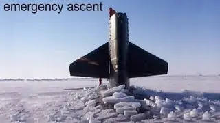 Submarine Surfaces Through Arctic Ice