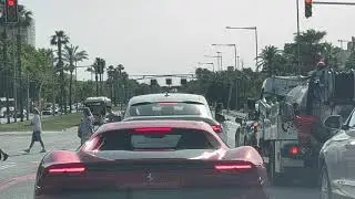 Driving in Barcelona with a Ferrari 296 GTB in front