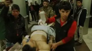 Raw: Medics Struggle with Flow of Injured Iraqis