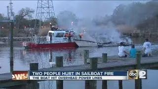 Sailboat hits power lines, catches fire in Dundalk