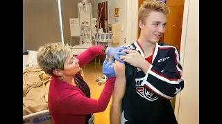 Flu shots the Americans way at Kadlec