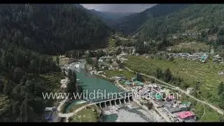 Barot Valley with dam in Himachal Pradesh: aerial view on a sunny winter day