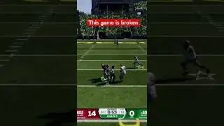 Two defenders and a referee and he still caught it #ncaa26