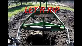 Ripping a Garden with a Frontier PS1001 Subsoiler on a Deere 3025e.