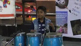 My star Pranav playing congo at a public performance