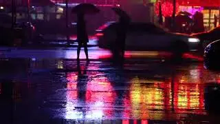 Two Woman With Umbrella Standing On The Middle Of An Empty