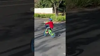 Carter learning to ride a bike