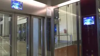 Singapore Changi Airport, Terminal 1 - Schindler 5500 MRL Panoramic Elevator