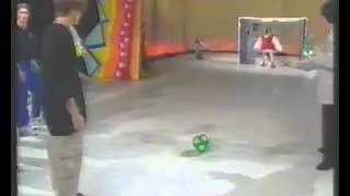 Robbie Williams and Mark Owen get past a duck