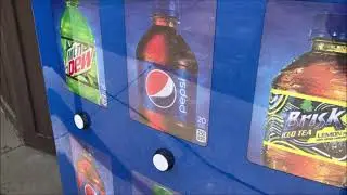 Buying a Pepsi Soda from a Pepsi Vending Machine