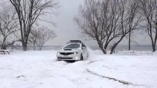 Subaru wrx drifting in snow (girl driving)