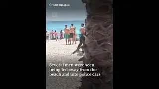 Tourists and locals tackle migrants fleeing boat on Spanish boat