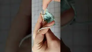 Learning purl decreases on a corner to corner dishcloth.