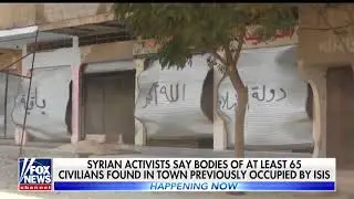 Syrian Activists Say 65 Bodies Found In Town Held By ISIS