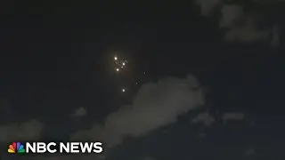 NBC News crew heads to safety on air as Iron Dome interceptors fly overhead