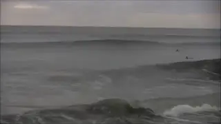 Surfing at the Casino Pier in Seaside Heights on fun Winter Day
