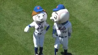 Mr. and Mrs. Met lead the crowd in 