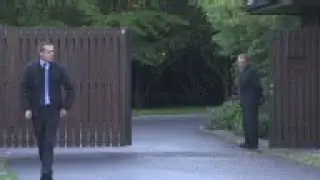 VW chief's car seen leaving his property